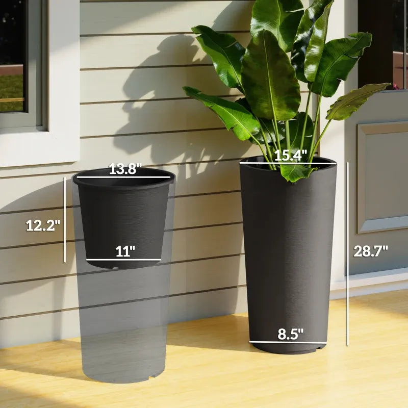 Set of 2 black flower pots by HouseOfZazla; tall planter with plant beside smaller pot on Tampa Home & Garden Store