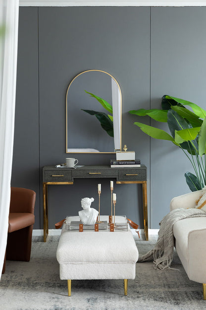 Arched wall mirror HouseOfZazla with gold frame above a dark console table in a living room on Tampa Home & Garden Store