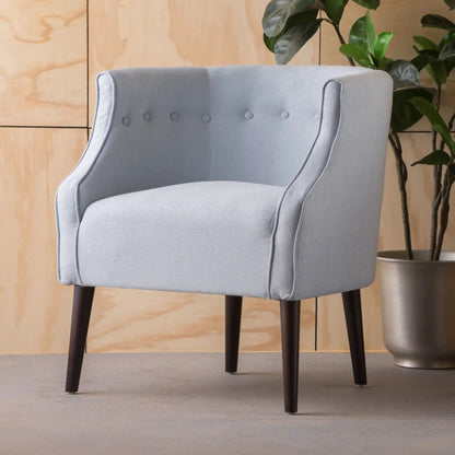 Contemporary club chair with button tufting, light gray fabric, dark wood legs on Tampa Home & Garden Store