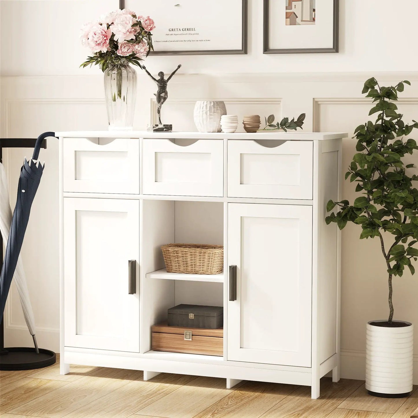 White storage cabinet sideboard with drawers and shelves, topped by pink flower vase on Tampa Home & Garden Store