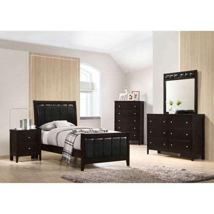 Twin panel bed with headboard and tapered legs in brown with two dark dressers on Tampa Home & Garden Store