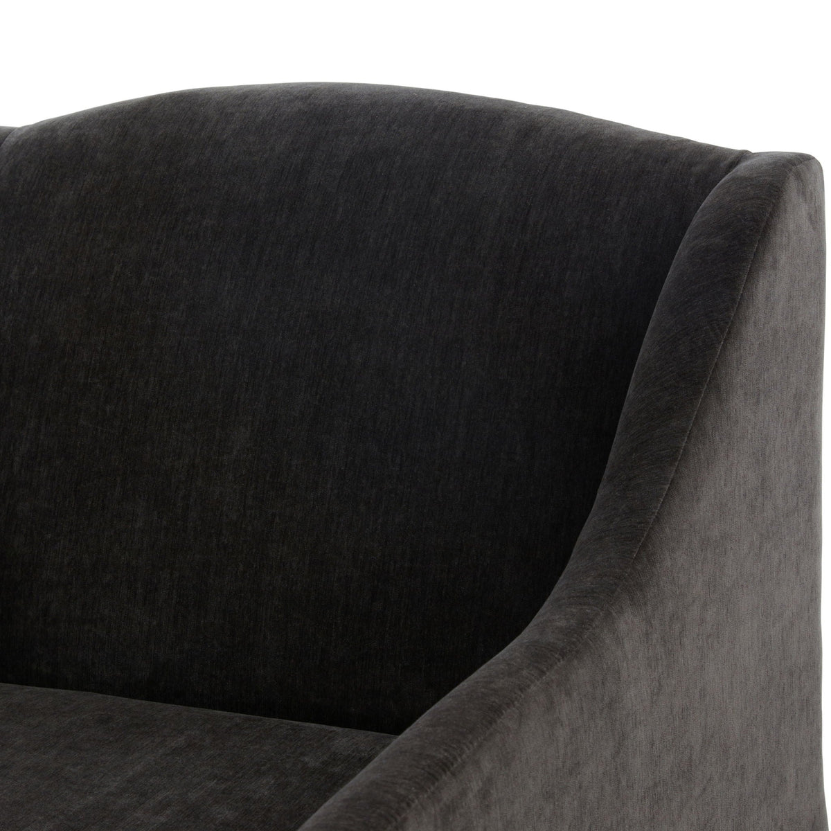 Skirted swivel accent chair close-up in dark charcoal velvet, curved arm by HouseOfZazla on Tampa Home & Garden Store