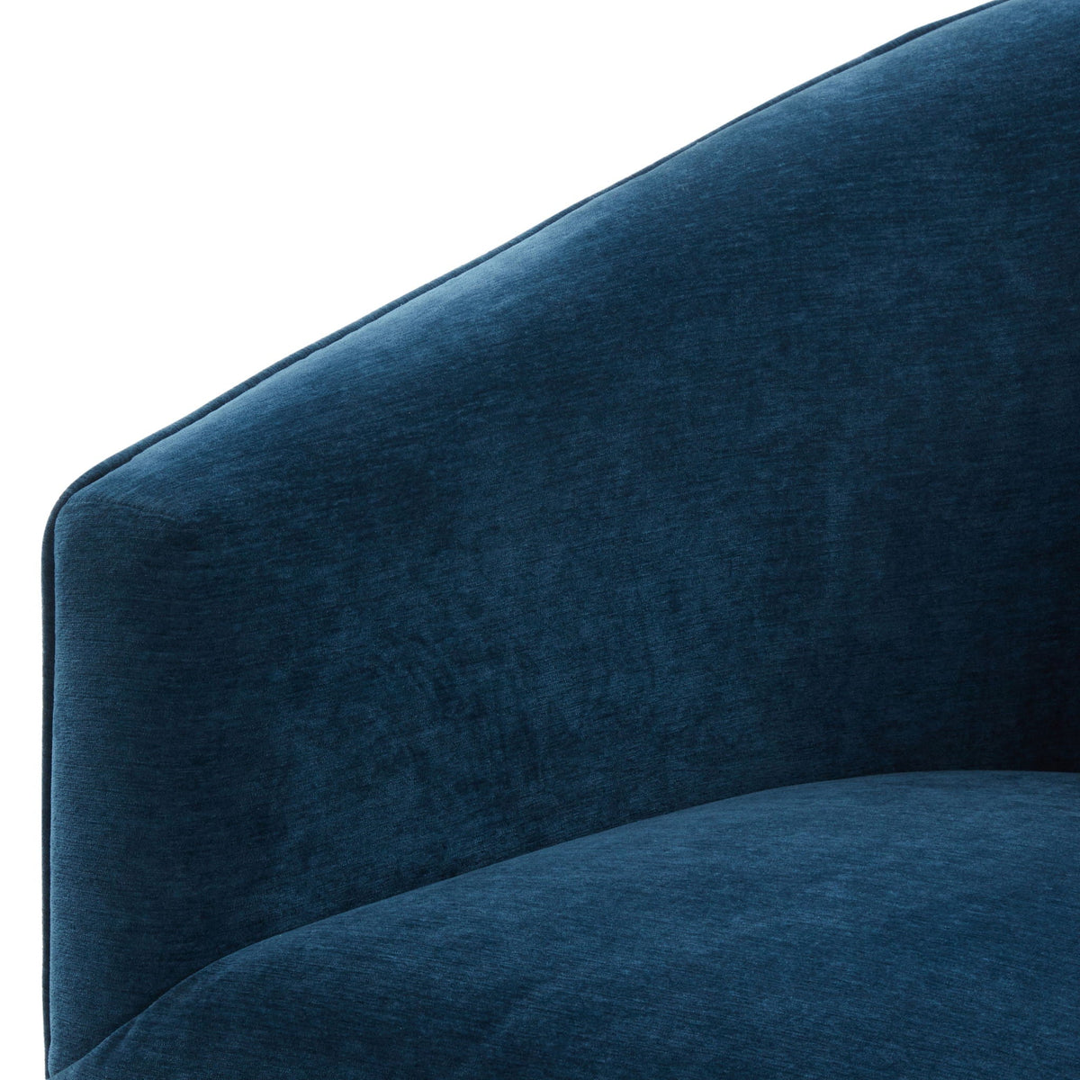 Skirted swivel chair blue velvet upholstery close-up with curved seam detail on Tampa Home & Garden Store