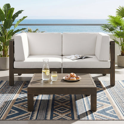 Brava X-Back 2-Seater sectional loveseat with coffee table in white cushions, ocean view on Tampa Home & Garden Store