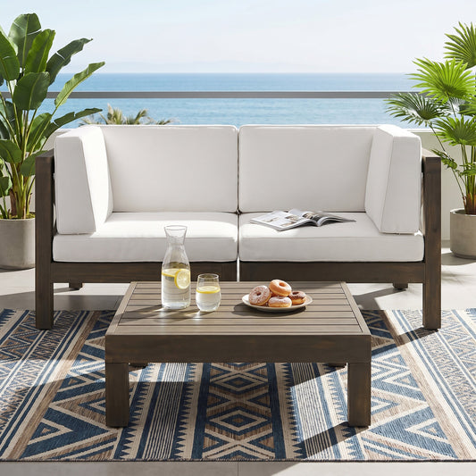 Brava X-Back 2-Seater sectional loveseat with coffee table in white cushions, ocean view on Tampa Home & Garden Store