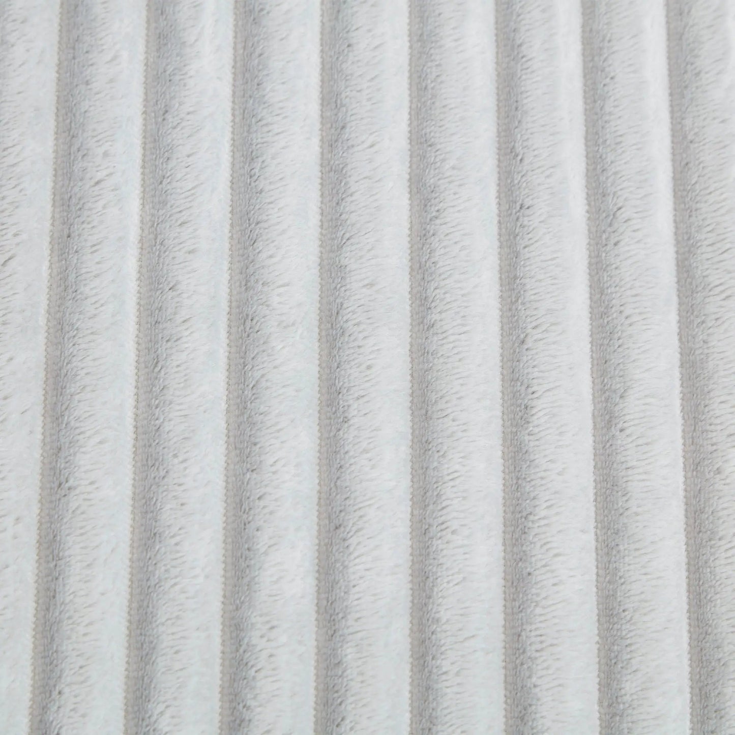 Chaises plush upholstery fabric close-up in light gray, soft fur-like texture on Tampa Home & Garden Store