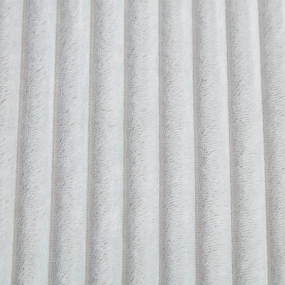 Chaises plush upholstery fabric close-up in light gray, soft fur-like texture on Tampa Home & Garden Store