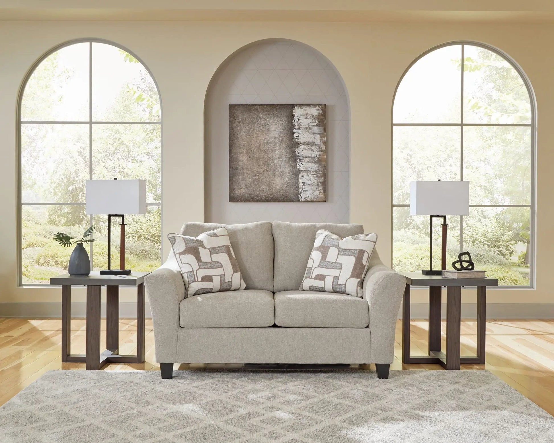 Willarae 2-Pc taupe sofa and loveseat by Unique Piece Furniture in a bright living room on Tampa Home & Garden Store