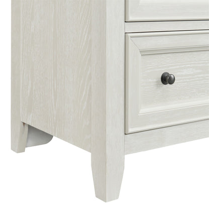 8-drawer dresser with framed fronts in light gray wash and dark metal knobs on Tampa Home & Garden Store