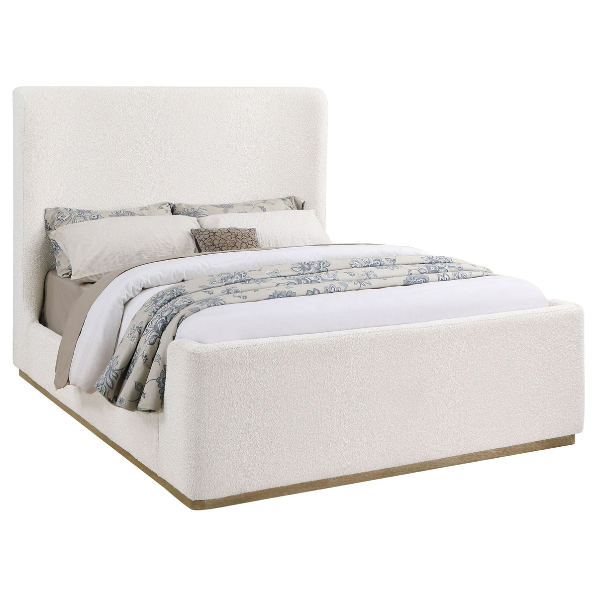 Vindra Queen Sleigh Bed in cream upholstery with tufted headboard and matching bedding on Tampa Home & Garden Store