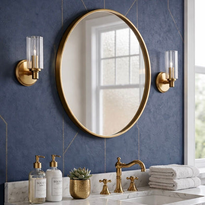 Jardin single light sconce clear ribbed satin glass with gold finish; pair beside mirror on Tampa Home & Garden Store
