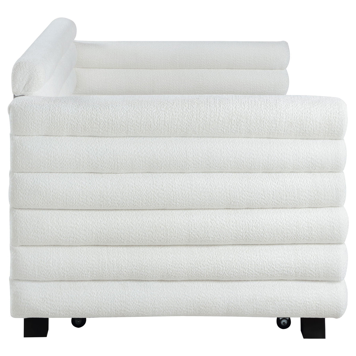 Fandango white towels stacked on a bed with black legs and wheels on Tampa Home & Garden Store