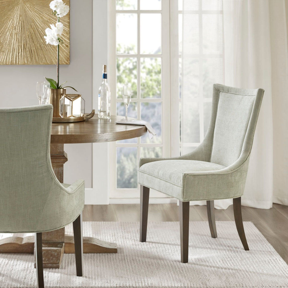 Elegant dining side chair set of 2 with solid wood legs in sage green upholstery on Tampa Home & Garden Store