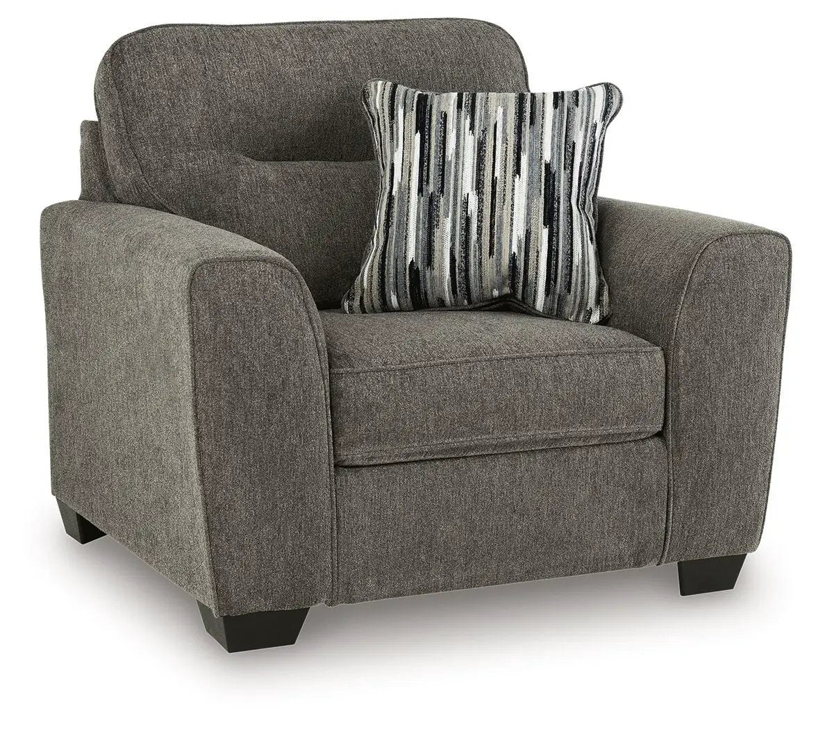 Olten stationary chair by Unique Piece Furniture in gray textured fabric with striped pillow on Tampa Home & Garden Store