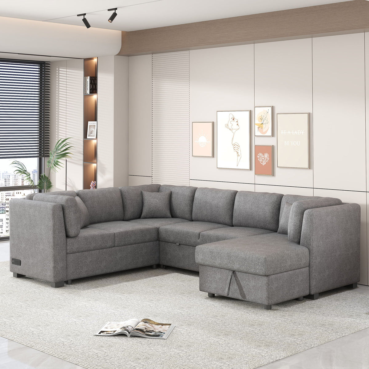 U-shaped sleeper sectional sofa in gray fabric with storage chaise in a modern living room on Tampa Home & Garden Store