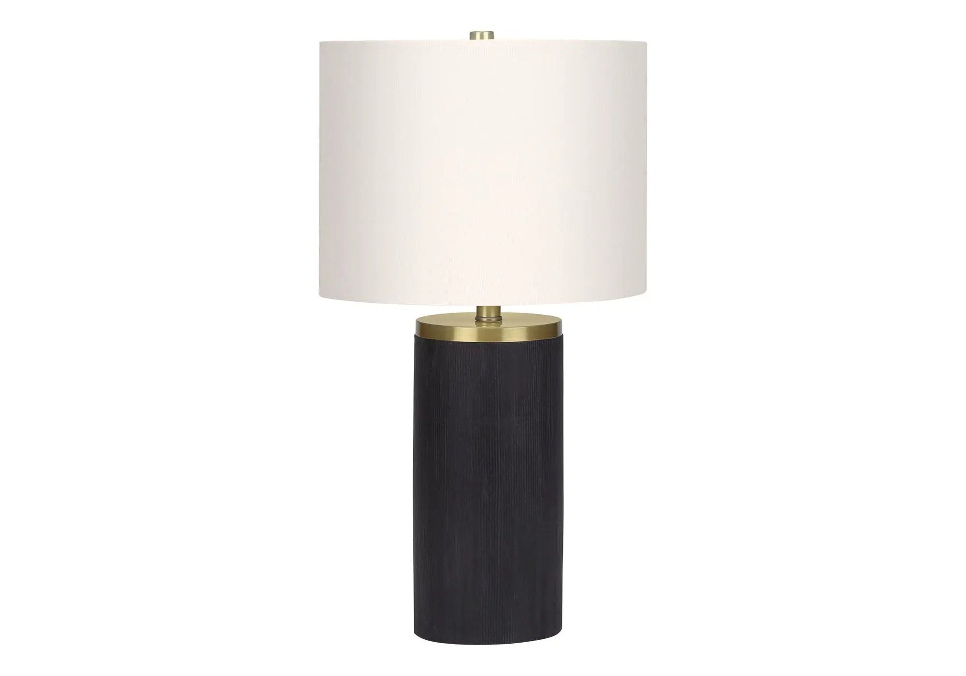 Table lamp with white fabric drum shade and black concrete-style base with brass accents on Tampa Home & Garden Store