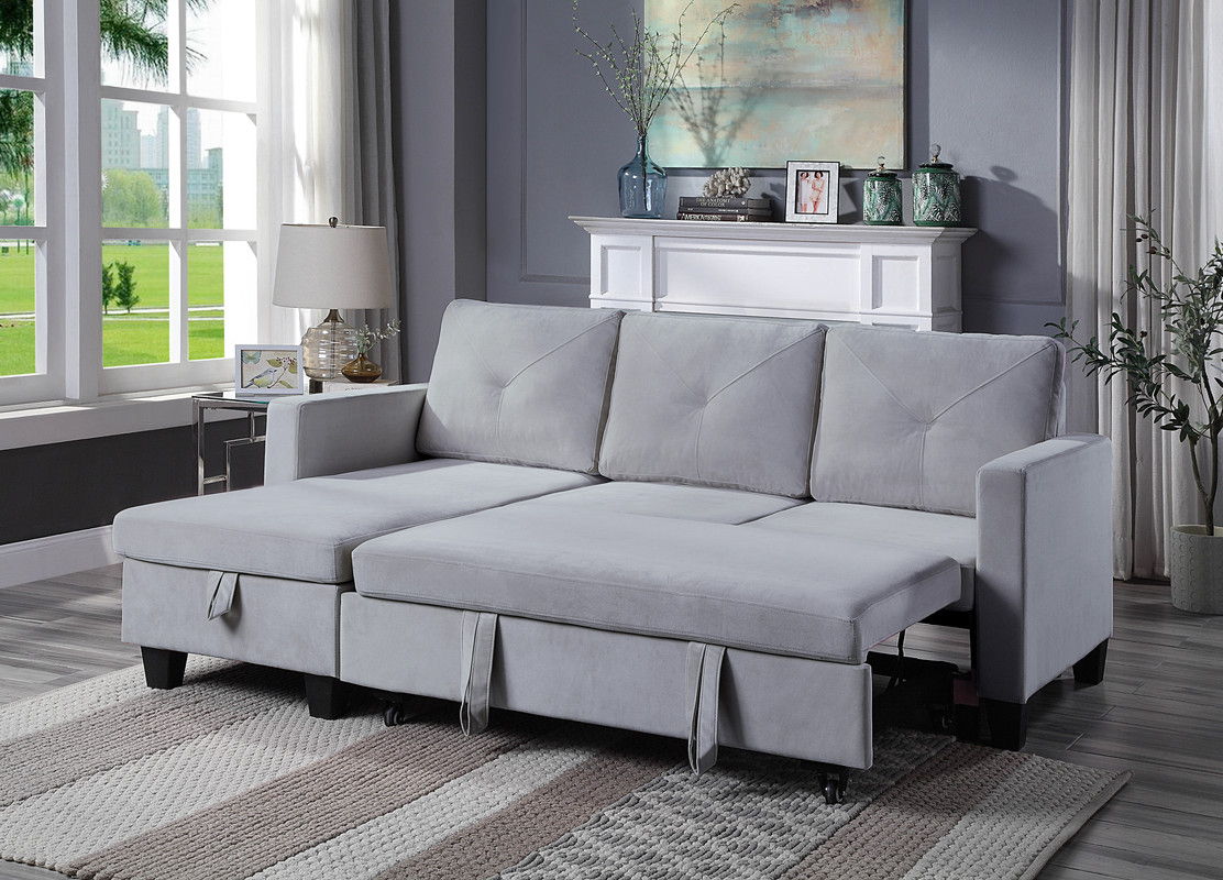 Nova reversible sleeper sectional with storage chaise in light gray fabric, 3 back cushions on Tampa Home & Garden Store