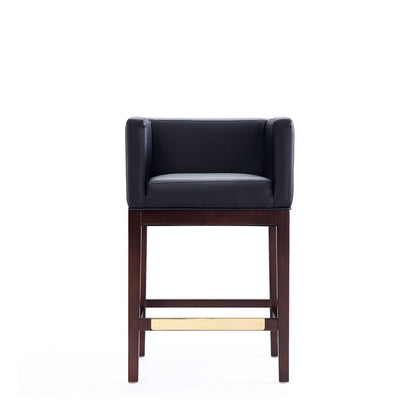 Counter height stool with navy upholstered seat and back, beech wood frame, brass footrest on Tampa Home & Garden Store