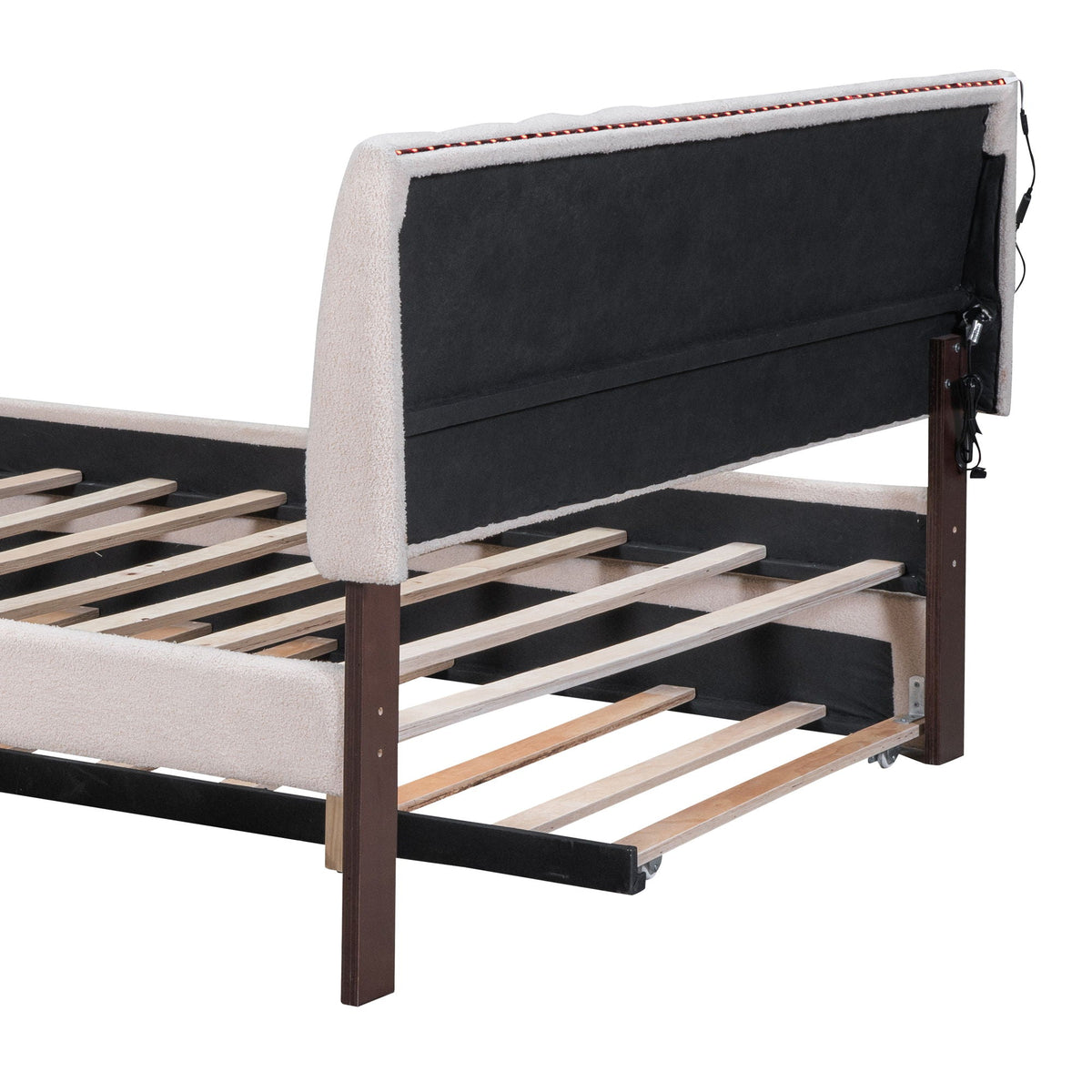 Upholstered platform bed with trundle, beige fabric, black headboard, wood slat base on Tampa Home & Garden Store