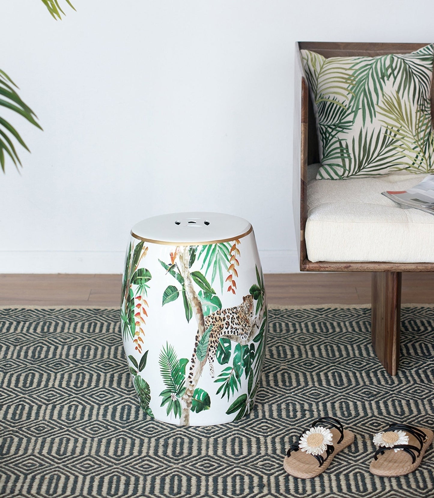 Jungle-themed ceramic garden stool with palm leaves and leopard accents, white with gold rim on Tampa Home & Garden Store