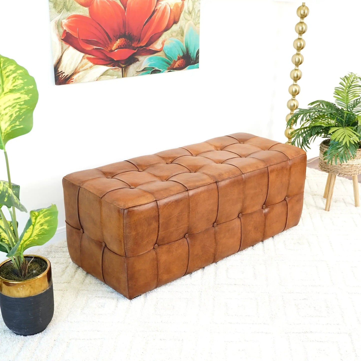 Benjiro tan upholstered tufted bench by Unique Piece Furniture in a bright room with plants on Tampa Home & Garden Store