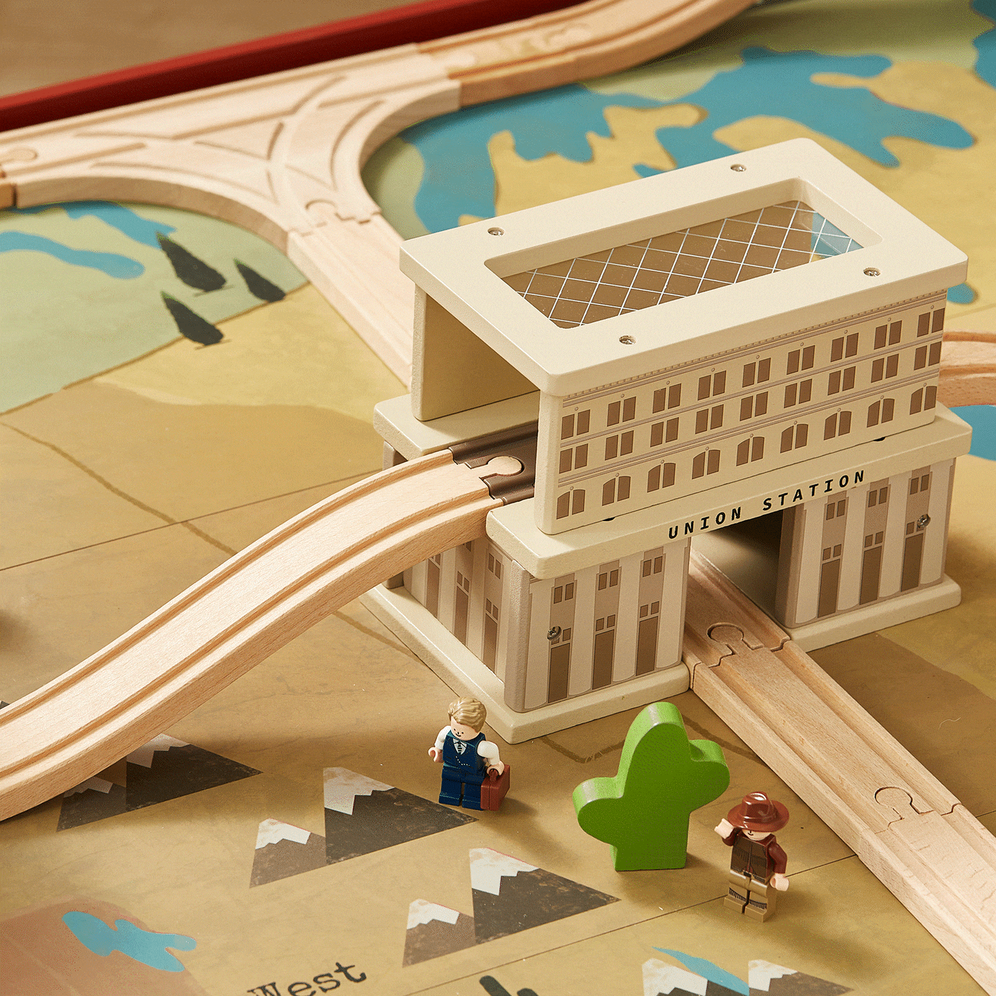 Tiny Land 1920 Railway Adventure Train Table in white with Union Station facade and curved tracks on Tampa Home & Garden Store