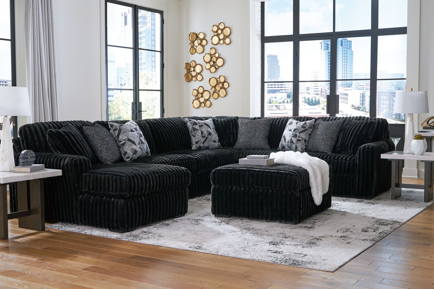 Midnight-Madness 4-piece sectional in black velvet with gray geometric cushions on Tampa Home & Garden Store