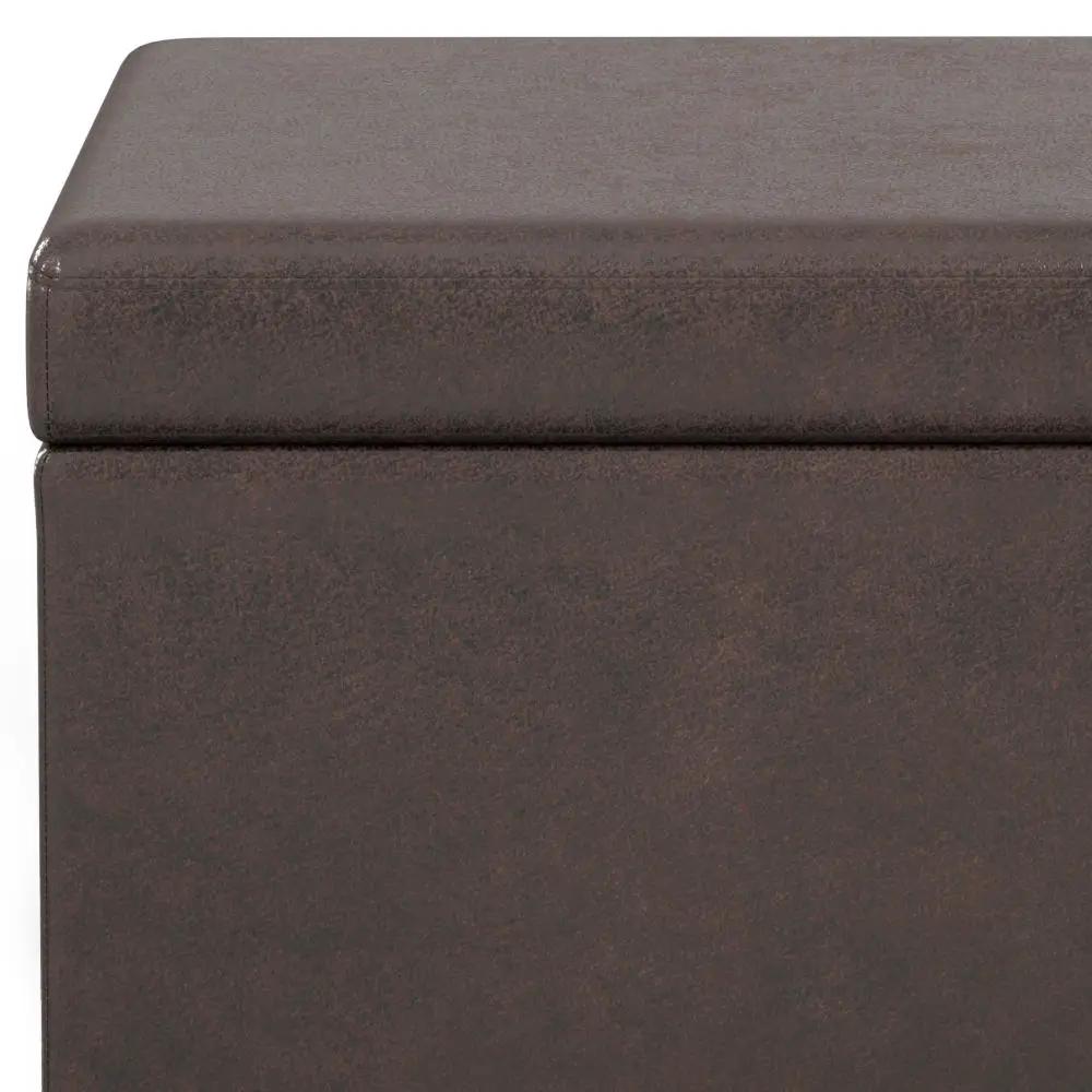 Avalon storage ottoman bench in brown distressed faux leather with lid and seam detail on Tampa Home & Garden Store