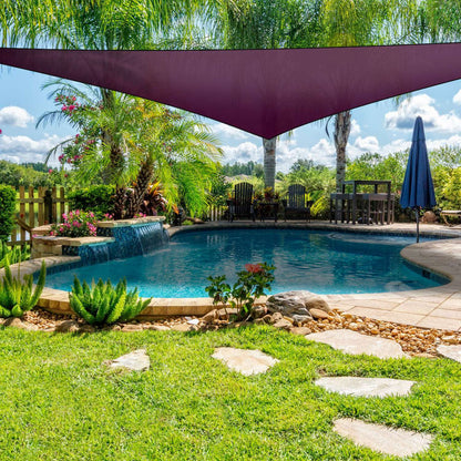 GemGear shade sail triangle canopy in purple over pool, with palms and outdoor seating on Tampa Home & Garden Store