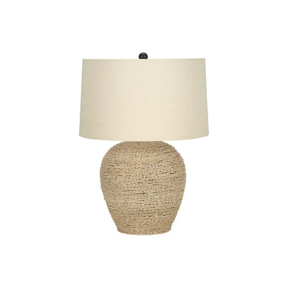 Table lamp with natural tan rattan woven base and beige fabric shade on Tampa Home & Garden Store