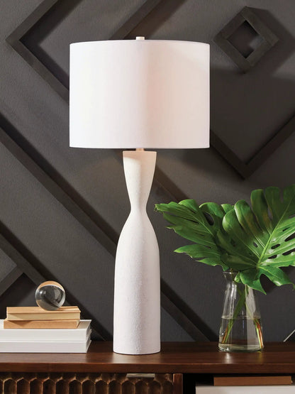 Davinford Poly Table Lamp white base with tapered body and white shade on dark wall on Tampa Home & Garden Store
