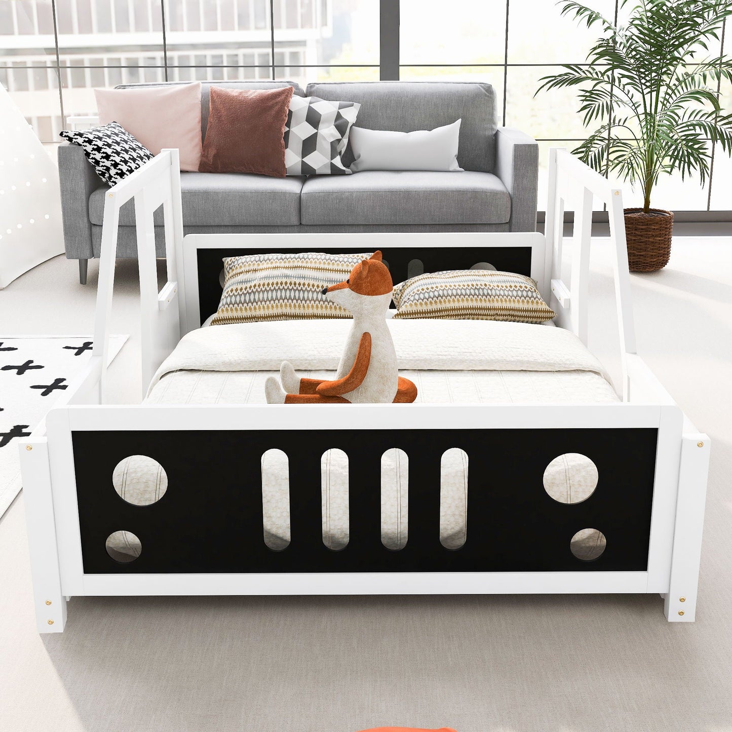 Classic car shaped platform bed with wheels, white frame and black front panel in a bright room on Tampa Home & Garden Store