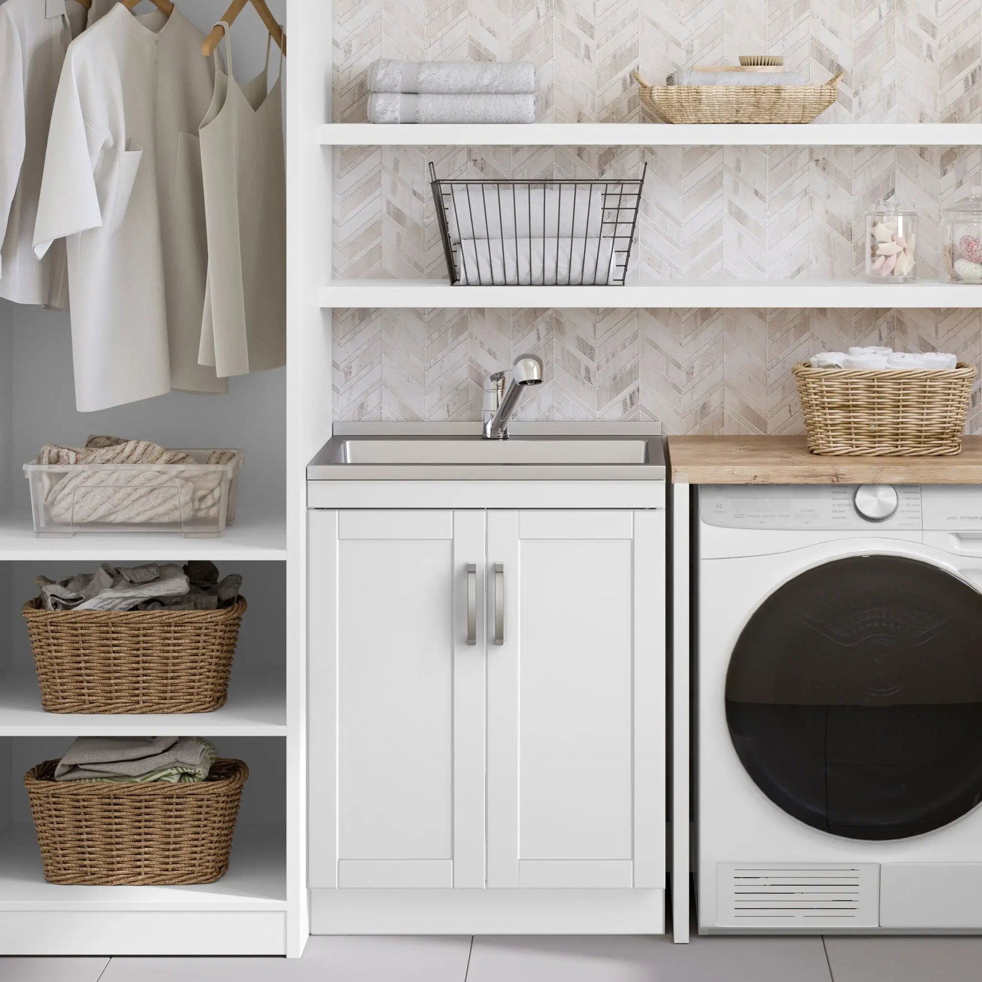 Kyle laundry cabinet with stainless steel sink and chrome faucet and white vanity with towels on Tampa Home & Garden Store