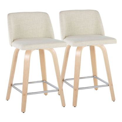 Beige pair of counter stools with light wood legs and chrome footrests on Tampa Home & Garden Store