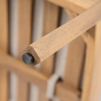 Mallorca acacia wood club chair frame close-up with natural grain and black end cap on Tampa Home & Garden Store