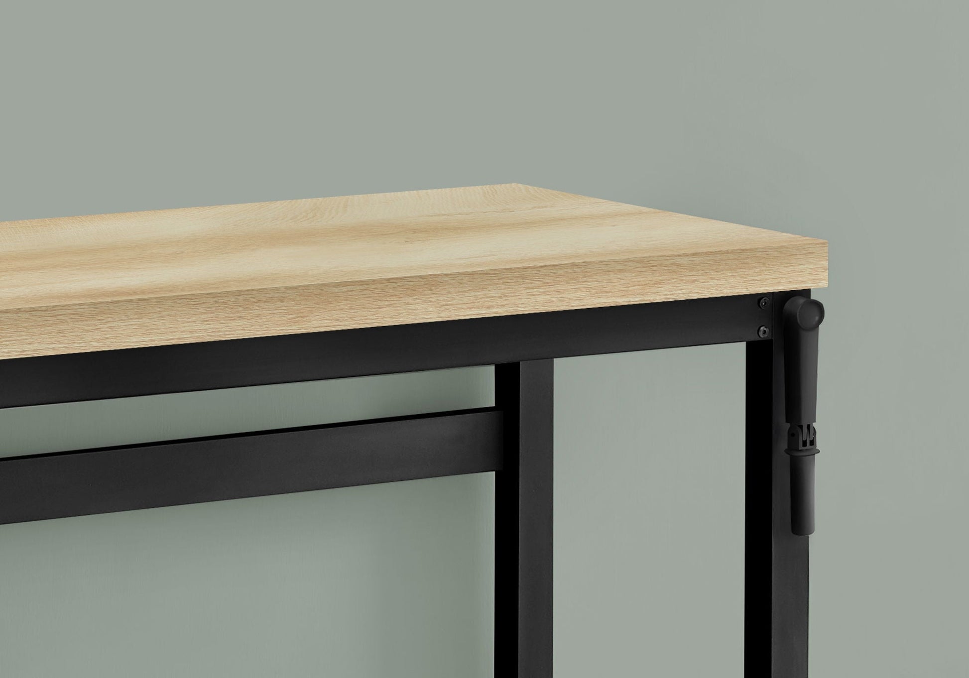 Adjustable standing computer desk with natural wood top and black metal frame on Tampa Home & Garden Store