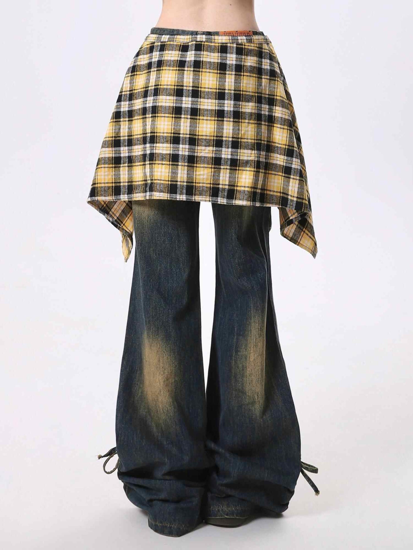 Yellow plaid wrap skirt overlay on dark bootcut jeans with elastic waist on Tampa Home & Garden Store
