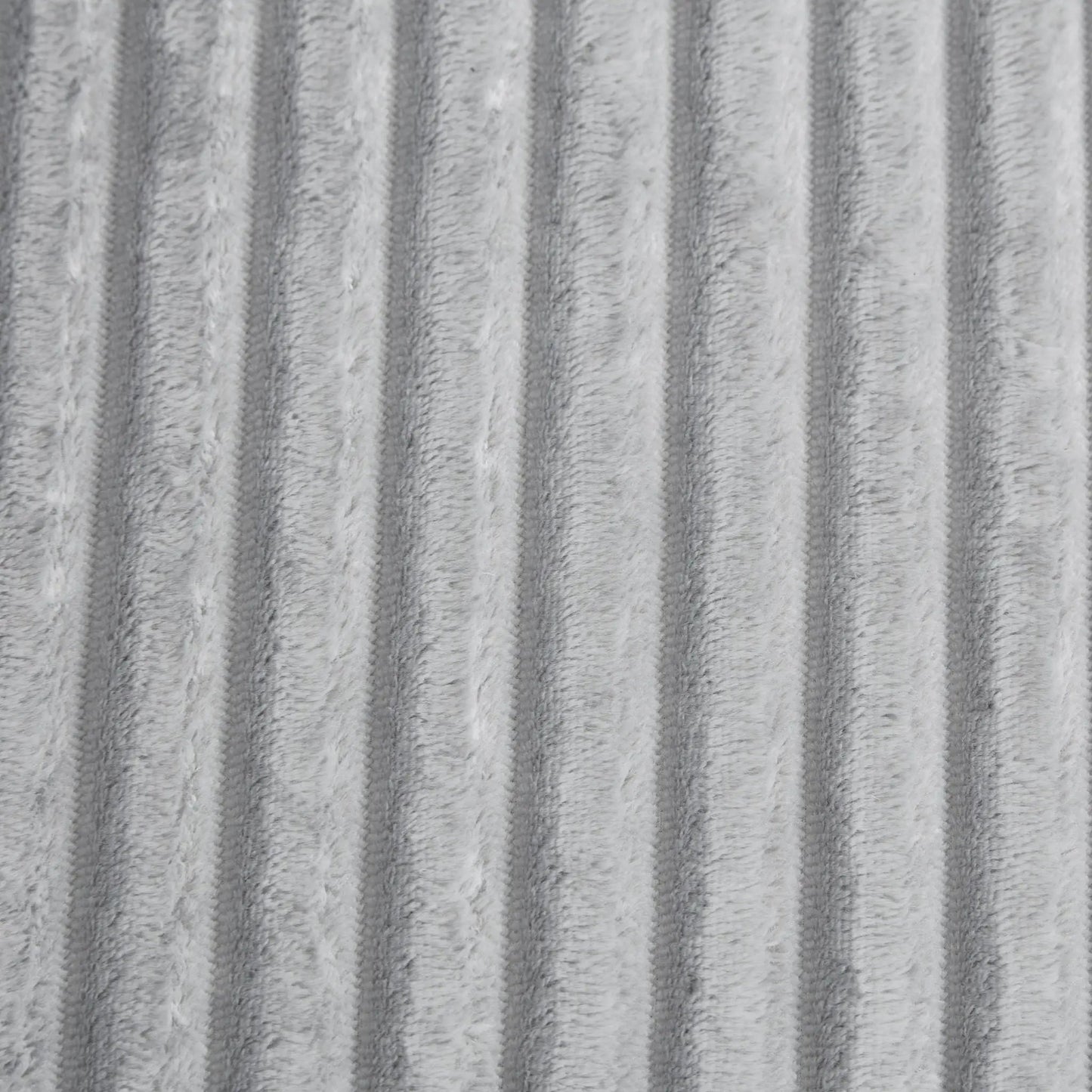 Chaise upholstery close-up in grey plush fabric with vertical ridges on Tampa Home & Garden Store