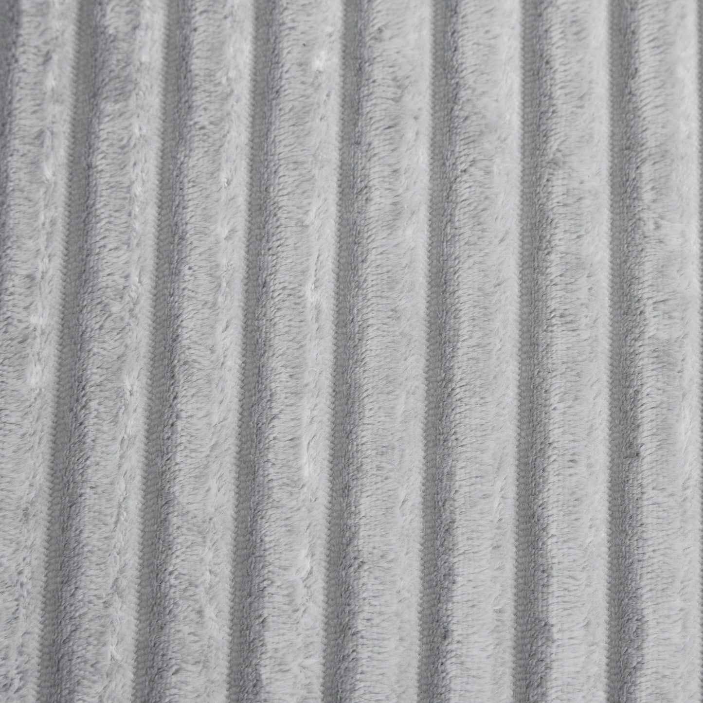 Chaise sofa fabric closeup in soft gray plush with vertical ridge texture on Tampa Home & Garden Store