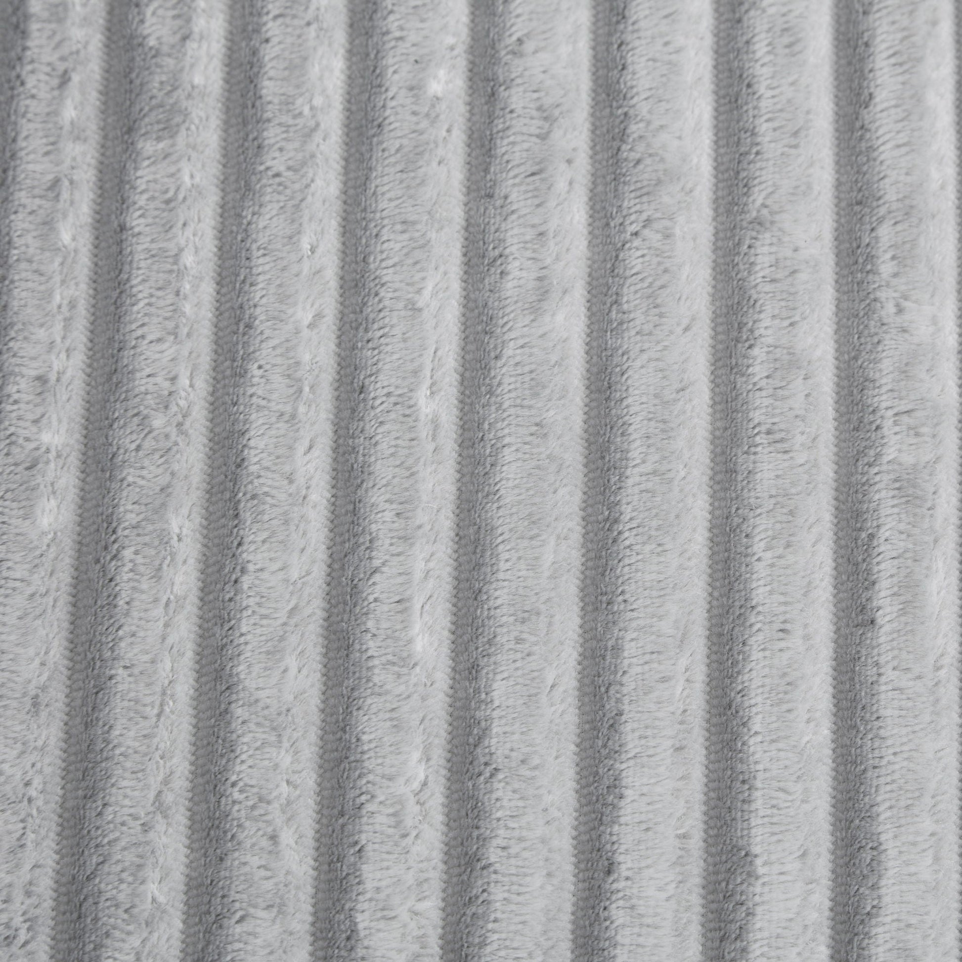 Chaise sofa fabric closeup in soft gray plush with vertical ridge texture on Tampa Home & Garden Store