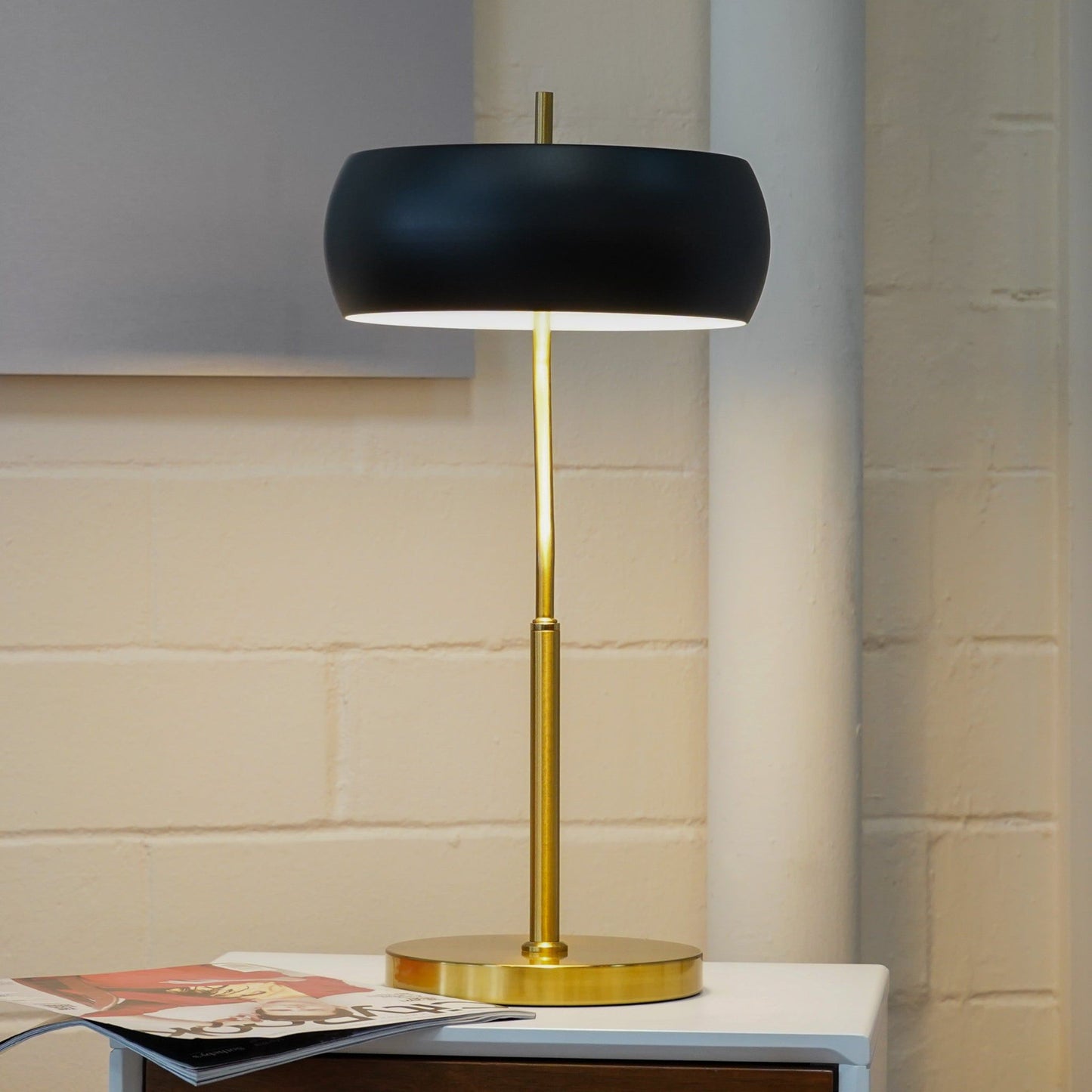Table lamp HouseOfZazla gold with black drum shade on brass stem and round base on Tampa Home & Garden Store