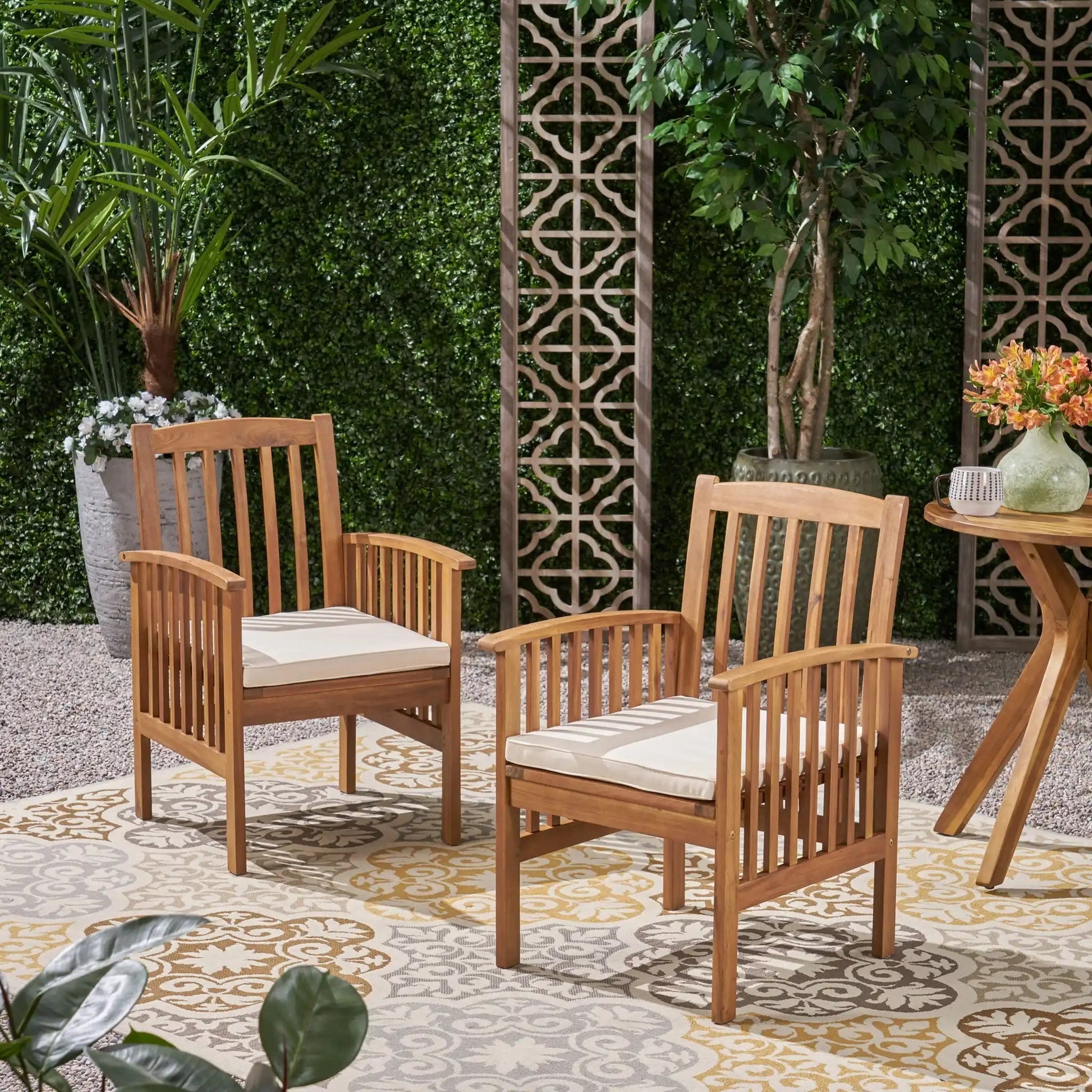 Casa Acacia Outdoor Dining Chairs with beige cushions, natural wood frames on Tampa Home & Garden Store