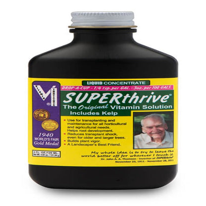 Superthrive Liquid Plant Nutrients fertilizer bottle Rivendell container black with yellow label on Tampa Home & Garden Store