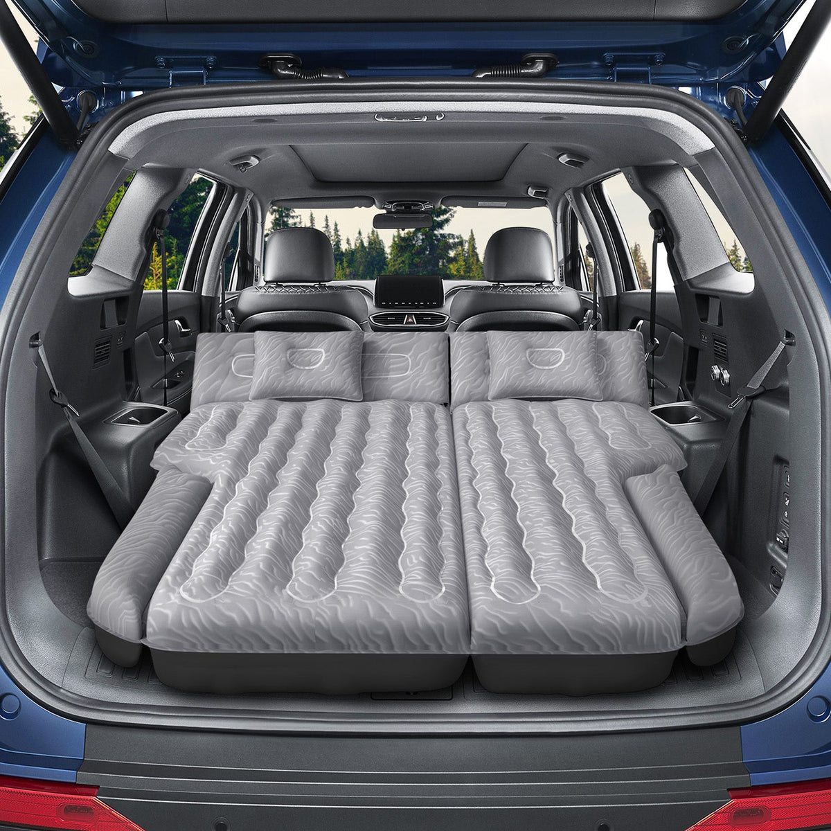 Umbrauto SUV air mattress 1.0 gray spread across rear cargo area with three pillows on Tampa Home & Garden Store