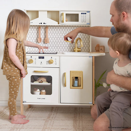 Tiny Land PopJoy Play Kitchen white and gold toy kitchen with wooden utensils and sink on Tampa Home & Garden Store
