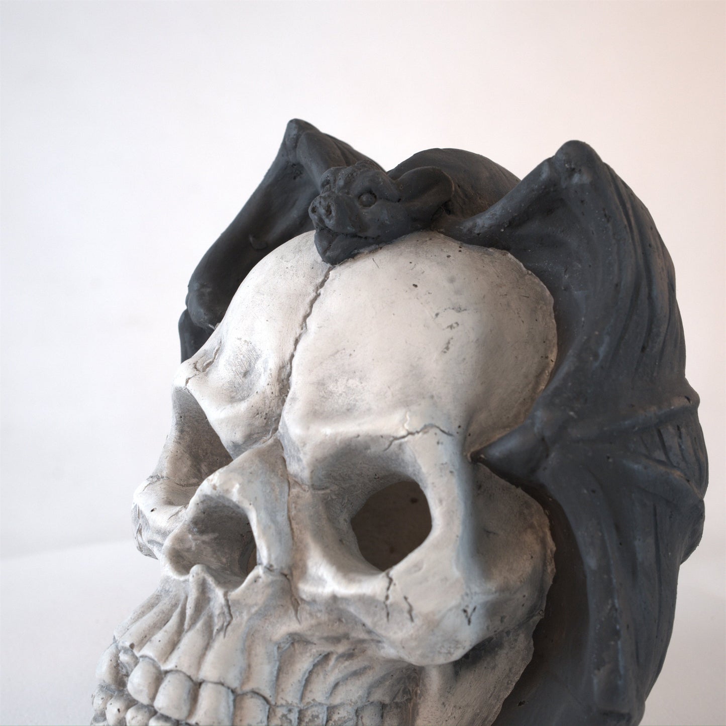Hand-Welded Fire Pit Skull Wall Art Set in dark metal with textured surface on Tampa Home & Garden Store