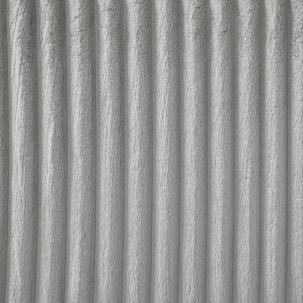 Gray plush upholstery texture close-up with vertical ridges on Tampa Home & Garden Store
