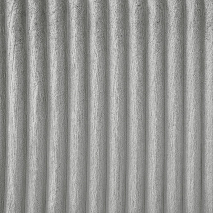 Gray plush upholstery texture close-up with vertical ridges on Tampa Home & Garden Store