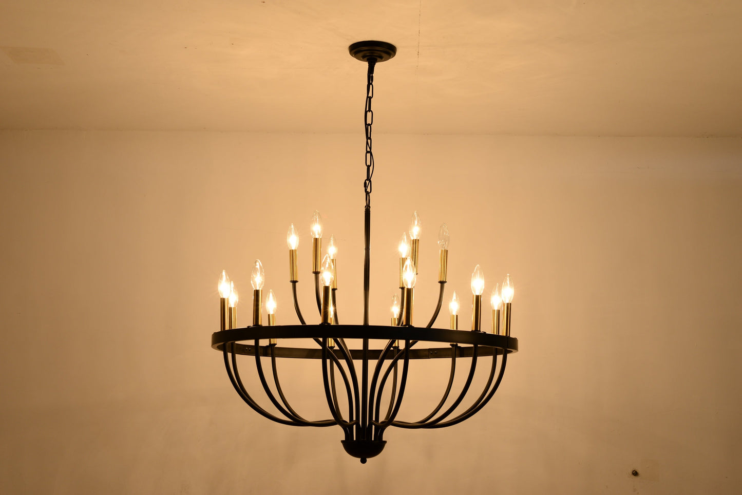 15-Light industrial iron chandelier with black metal frame and circular ring of candle bulbs hung by chain on Tampa Home & Garden Store