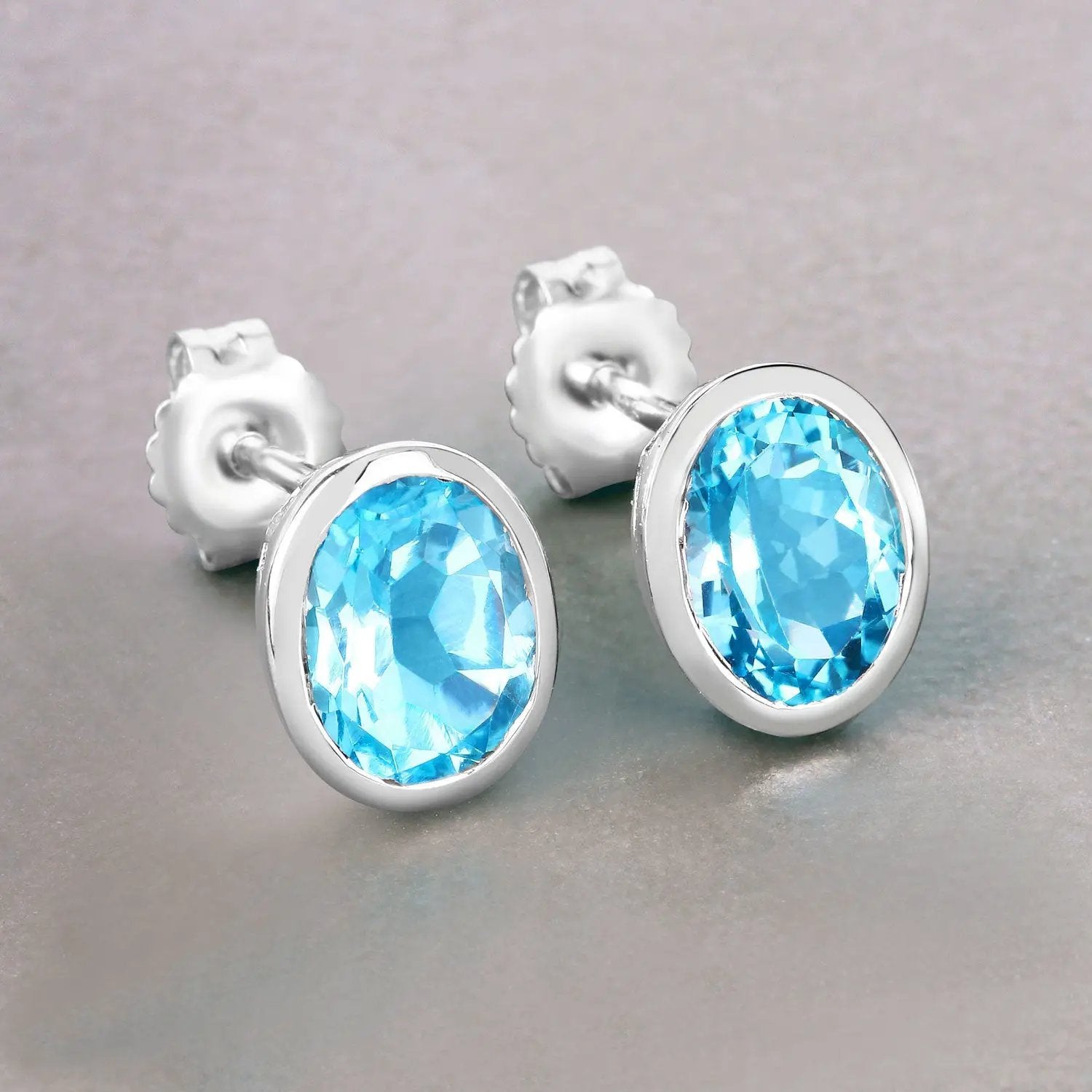 Earrings: 4.00ct Swiss Blue Topaz stud earrings in .925 sterling silver bezel settings on Tampa Home & Garden Store